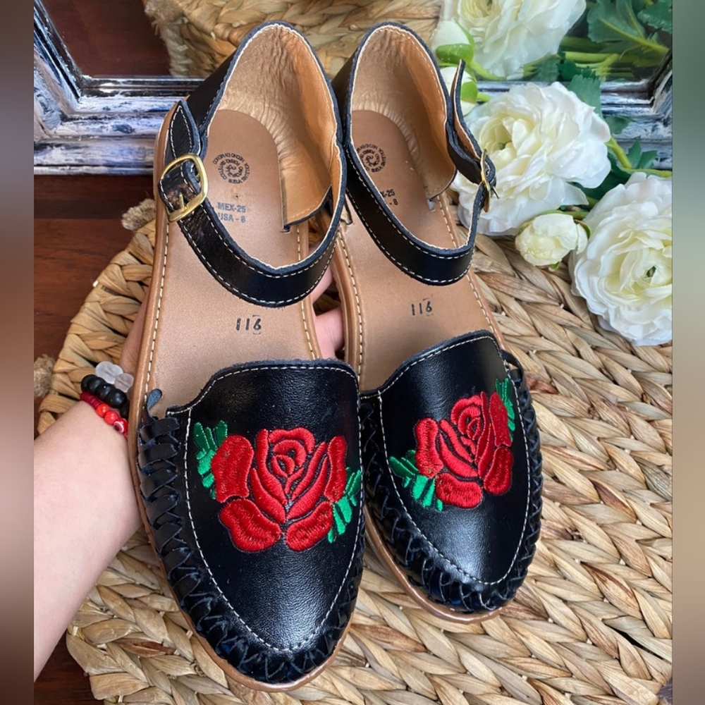 Black leather rose huaraches sandals